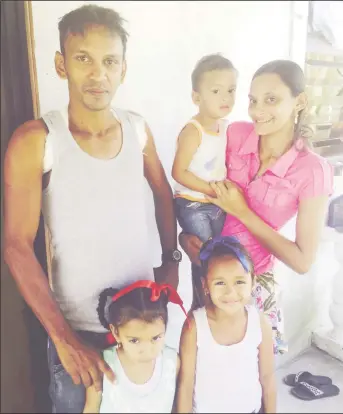  ??  ?? Roberto Ramnarine and his family