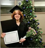  ?? GNTC ?? YSA graduate Caite Castillo, of Rome, moments after receiving her GED diploma on Tuesday, Dec. 7, at GNTC’s Floyd County Campus.