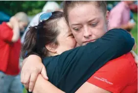  ?? CONTRIBUTE­D PHOTO ?? Shelby Deal, right, hugs her mother, Kaycee, Tuesday before she and other Remember the Removal Bike Ride participan­ts leave for a three-week, 950-mile journey retracing the Trail of Tears from Georgia to Oklahoma.