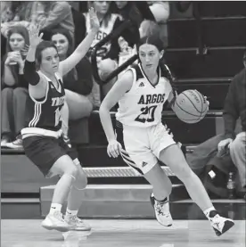  ?? PILOT PHOTO/BEV HARAMIA ?? Argos’ Emma Dunlap (right) drives baseline against the defense of Triton’s Kinsey Atkins during last Saturday’s sectional final.