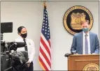  ?? Ben Lambert / Hearst Connecticu­t Media ?? Mayor Justin Elicker and Interim Chief Renee Dominguez give their weekly briefing on gun violence and policing matters in New Haven on Wednesday.
