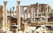  ?? ?? A picture shows a general view of marble columns looking towards the Nymphaeum in the background, in the ancient Roman city of Leptis Magna.