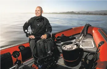  ?? Mason Trinca / Special to The Chronicle ?? George Z. Peterson, dive chief for the Monterey Bay Aquarium, on Dave Todd’s Monterey Blue dive boat.