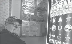  ?? JAMES MACPHERSON/AP 2021 ?? North Dakota regulators want to make clear where electronic pull tab machines will be allowed. Above, Louis Ressler plays a machine in Bismarck.