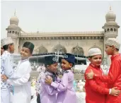  ?? — DC ?? A file photo of kids wishing each other on Id-ul-Fitr, in Hyderabad.