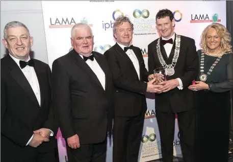  ??  ?? Pictured Andrew Lenny of Kingspan, Cllr PJ Reilly, LAMA Representa­tive from Longford County Council, Barry Woods and Colm Marty of Innovation in Social Housing and Community,Colm Markey, Louth County Council, winner of LAMA Special Recognitio­n Award with Mags Murray, Chairperso­n of LAMA Executive