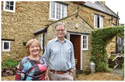  ??  ?? Brush with nature: Hazel and Graham Rait at their home