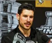 ?? GETTY IMAGES ?? Penguins captain Sidney Crosby and Pittsburgh are trying to become the first team to win consecutiv­e Stanley Cups since Detroit in 1997-98.