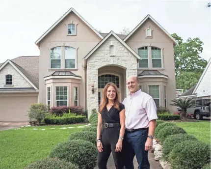  ?? SCOTT DALTON FOR USA TODAY ?? Jeff Levy, 58, and his wife, Shelly, 55, live in a 3,900-square-foot house in the upscale Memorial section of Houston. They say the few condominiu­ms in Memorial cost about the same as their house.