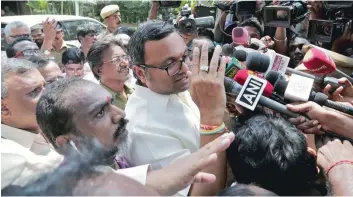  ?? — Reuters ?? Karti Chidambara­m talks to the media after the CBI raided his house in Chennai.