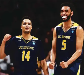  ?? The Washington Post ?? UC Irvine’s Evan Leonard and Jonathan Galloway celebrate after closing out a first round upset vs. Kansas State on Friday at the SAP Center in San Jose.