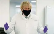  ?? (Photo AFP) ?? « Aujourd’hui, nous avons atteint une étape importante dans le processus de vaccinatio­n», a tweeté hier le Premier ministre britanniqu­e, Boris Johnson.