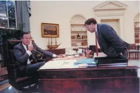  ??  ?? President George H.W. Bush and his chief of staff, John Sununu, at the White House, October 1990