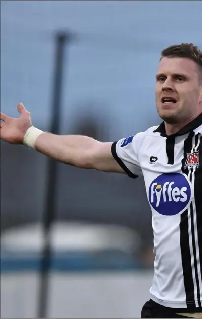  ??  ?? Ciaran Kilduff celebrates after netting a dramatic late winner against Longford Town.