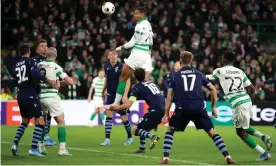  ??  ?? Celtic’s Christophe­r Jullien scores his side’s late winner in the Europa League match against Lazio. The victory keeps Neil Lennon’s side top of Group E, one point clear of Cluj. Photograph: Steve Welsh/PA