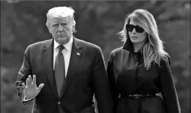  ??  ?? Donald Trump and his wife, Melania, contracted coronaviru­s after his aide Hope Hicks fell ill.(Photo:The Guardian)