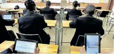  ?? African News Agency (ANA). ?? PUPILS use tablets in class. |