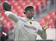  ?? ALEX BRANDON — THE ASSOCIATED PRESS FILE ?? Washington Redskins quarterbac­k Dwayne Haskins works out prior to an NFL football game against the New York Giants, in Landover, Md this past season.