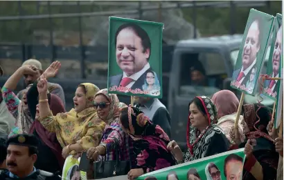  ?? AFP ?? Supporters of ousted prime minister Nawaz Sharif shout slogans outside an accountabi­lity court in Islamabad on Wednesday. —