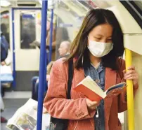  ??  ?? New rules: From June 15, face coverings are a requiremen­t on public transport