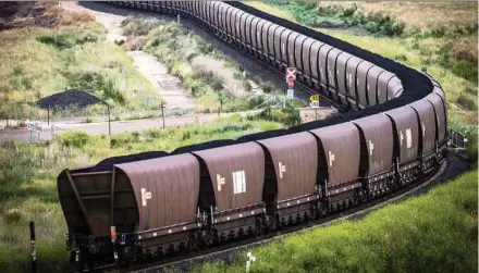  ?? BLOOMBERG PIC ?? A freight train transporti­ng coal in Australia. According to research by the Insure Our Future campaign, 65 insurers with combined assets of US$12 trillion have so far divested from coal.