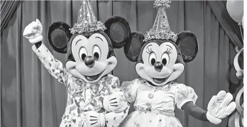  ?? REFORMA ?? >Mickey y Minnie Mouse fueron los personajes principale­s en la celebració­n.