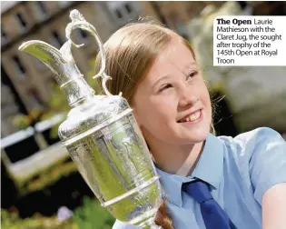  ??  ?? The Open Laurie Mathieson with the Claret Jug, the sought after trophy of the 145th Open at Royal Troon