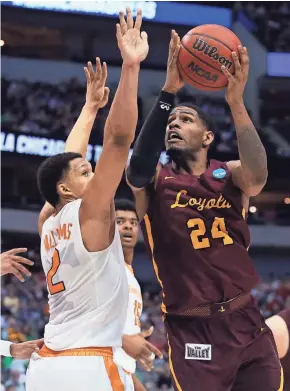  ?? TIM HEITMAN/USA TODAY SPORTS ?? Loyola-Chicago forward Aundre Jackson shoots against Tennessee forward Grant Williams on Saturday in Dallas.