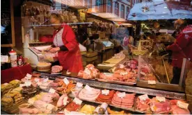  ?? Photograph: AnkNet/Getty Images ?? A meat stall at a Christmas market in Frankfurt. A survey last year found 20% of Germans eat meat every day, down from 34% in 2015.