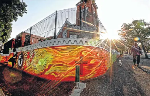  ?? Picture: Sandile Ndlovu ?? A mural at Manning Road Methodist Church in Durban highlighti­ng global warming has got the local heritage agency hot under the collar.