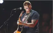  ?? AP PHOTO/MARK HUMPHREY ?? Country singer Jimmie Allen performs “Best Shot” at the 2019 CMT Music Awards in Nashville.