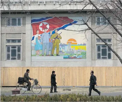  ?? DAVID GUTTENFELD­ER/ THE ASSOCIATED PRESS ?? On the streets of North Korea there was no sense of panic among the people Wednesday. ‘ The people of Pyongyang are confident. They know we can win any war,’ said a former soldier.
