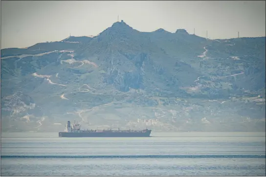  ??  ?? A view of the vessel ‘Clavel’ sailing on internatio­nal waters crossing the Gibraltar stretch on Wednesday, May 20, 2020. Five Iranian tankers likely carrying at least $45.5 million worth of
gasoline and similar products are now sailing to Venezuela, part of a wider deal between the two US-sanctioned nations amid heightened tensions between Tehran and Washington. (AP)