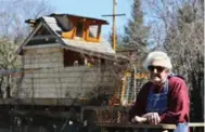  ?? STEVE RUSSELL/TORONTO STAR ?? Marita Bagdonas, 90, says her neighbour’s treehouse throws too much shadow over her backyard. The city has ordered the owner to take it down.