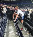  ??  ?? Stand-off: Dier confrontin­g the abusive fan in March