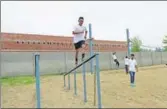  ?? PHOTO: PATANJALI ?? Young recruits of Ramdev's security agency undergo training at Patanjali complex in Haridwar.