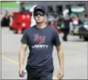  ?? CHARLIE NEIBERGALL — THE ASSOCIATED PRESS ?? William Byron walks in the garage area during Xfinity Series practice Friday at Iowa Speedway in Newton, Iowa.