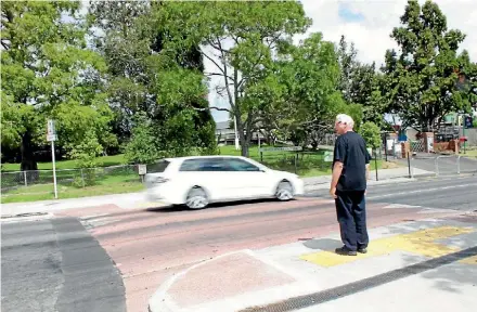  ??  ?? A hump on West Coast Rd, in front of Oratia District School and Oratia Kindergart­en, is causing a lot of confusion.