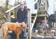  ?? STAFF PHOTO BY ERIN O. SMITH / ?? Bryant Ellis sits outside his home in Hixson with his post-traumatic stree disorder service dog, Whiskey. Ellis was one of several people to receive assistance from the Neediest Cases fund.