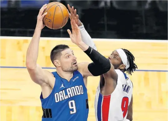  ?? JOE SKIPPER/AP ?? Magic center Nikola Vucevic is playing like an All-Star and has scored 30 or more points seven times this season.