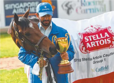  ??  ?? SWEET: Trainer Saeed bin Suroor poses with Caulfield Cup winner Best Solution at Werribee yesterday. Picture: GETTY IMAGES