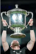  ?? GETTY IMAGES ?? The Bledisloe Cup remains in Kieran Read’s hands.