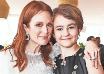  ?? DAVE BENETT, GETTY IMAGES FOR NIKKI BEACH ?? Julianne Moore and Millicent Simmonds star in Wonderstru­ck, set in both the 1920s (filmed in black and white) and the 1970s.
Rose (Simmonds) meets her idol, actress Lillian Mayhew (Moore), in the portion of the film set in 1927.