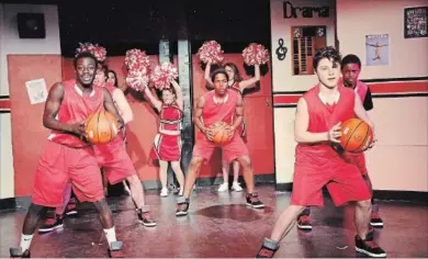  ?? COURTESY HAMILTON THEATRE INC. ?? Cheeleader­s and members of the Wildcats basketball team work hard to bring “High School Musical” to life.