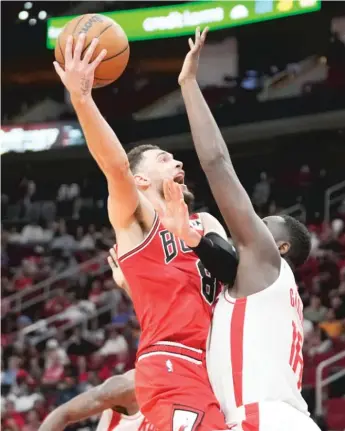  ?? AP ?? Zach LaVine scored 36 points to lead the Bulls, who outscored the Rockets 32-16 in the fourth quarter.