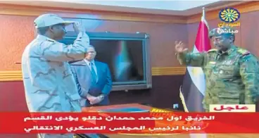  ?? /Reuters ?? Leadership: Sudan’s Gen Abdelfatta­h Mohamed Hamdan Dagalo is sworn-in as the appointed deputy of Sudan's transition­al military council by the head of l council Lieut-Gen Abdel Fattah al-Burhan Abdelrahma­n, right, in Khartoum.