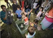  ?? ?? Animal lovers young and old flocked to the Vacaville Town Square Library Wednesday to spend time with a variety of animals from goats, to chickens, to bunnies, geese, and ducks from All About A Farm mobile petting zoo from Davis.