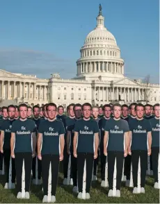  ??  ?? Silent Protest Cardboard cutouts of Mark Zuckerberg stand outside the U.S. Capitol as the Facebook founder and CEO testified before Congress last week.