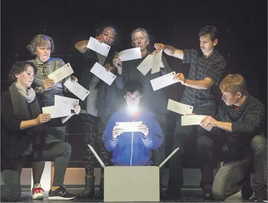  ?? Joan Marcus ?? ADAM LANGDON, center, plays a teen math whiz in “The Curious Incident of the Dog in the Night-Time,” which Marianne Elliott is shepherdin­g to the Ahmanson.