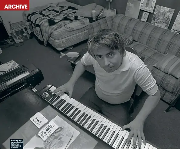  ?? ?? Soul-baring songs: Daniel Johnston composing at home